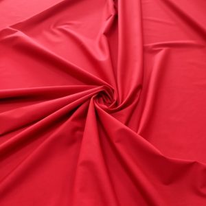 Tela de popelín elastizado, color rojo, un básico en moda