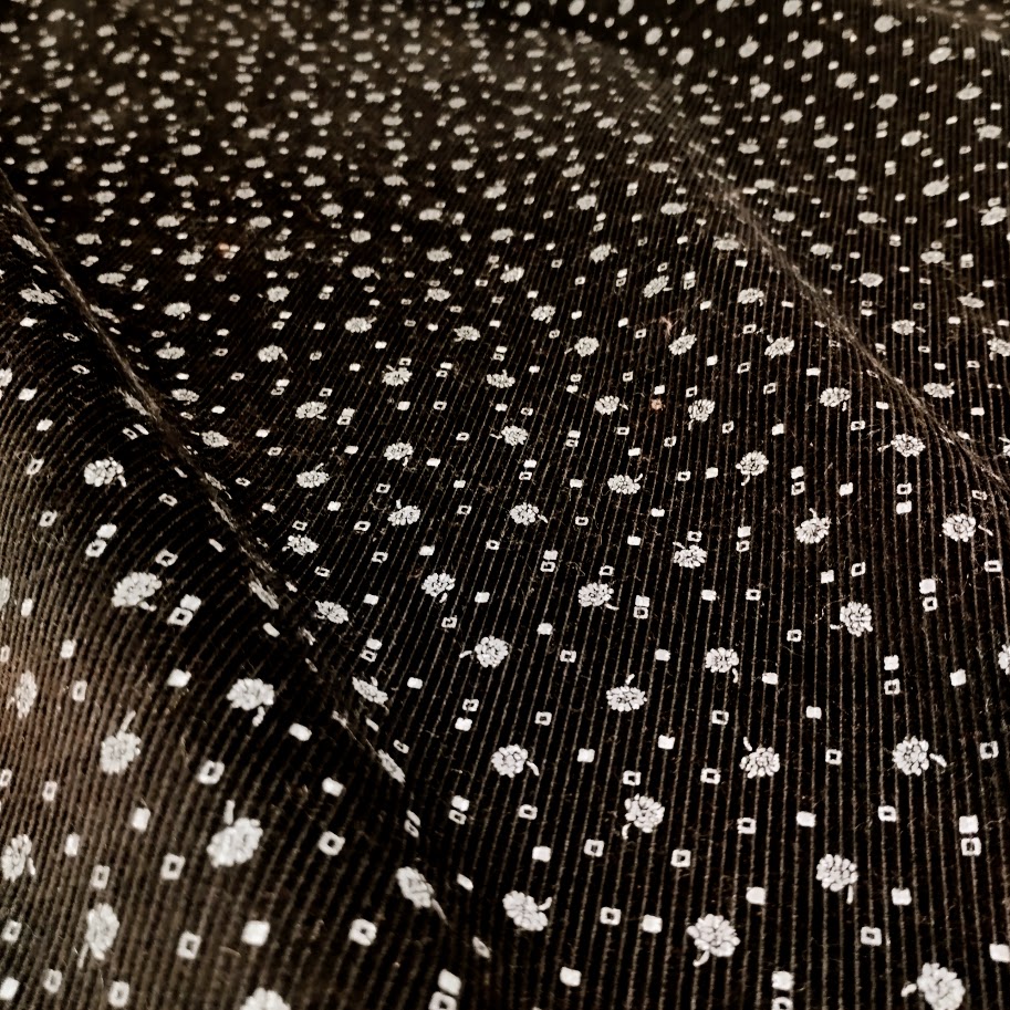 Tela de micropana estampada negro y blanco